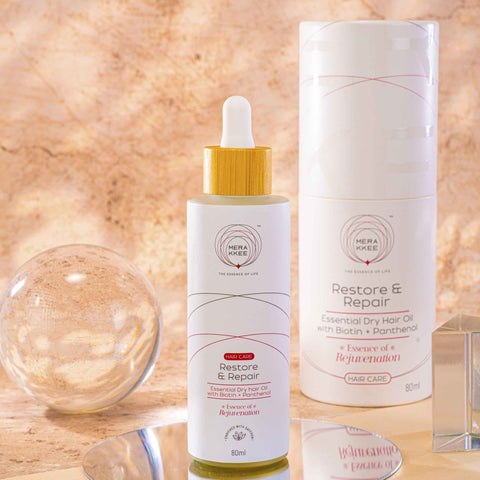 MERAKKEE Essential Dry Hair Oil — outer carton and dropper bottle complete package — gift-ready premium hair care India