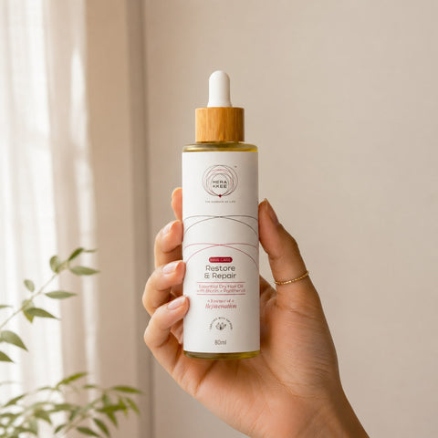 MERAKKEE Essential Dry Hair Oil 80ml — dropper bottle held in hand size reference — Restore & Repair Rejuvenation