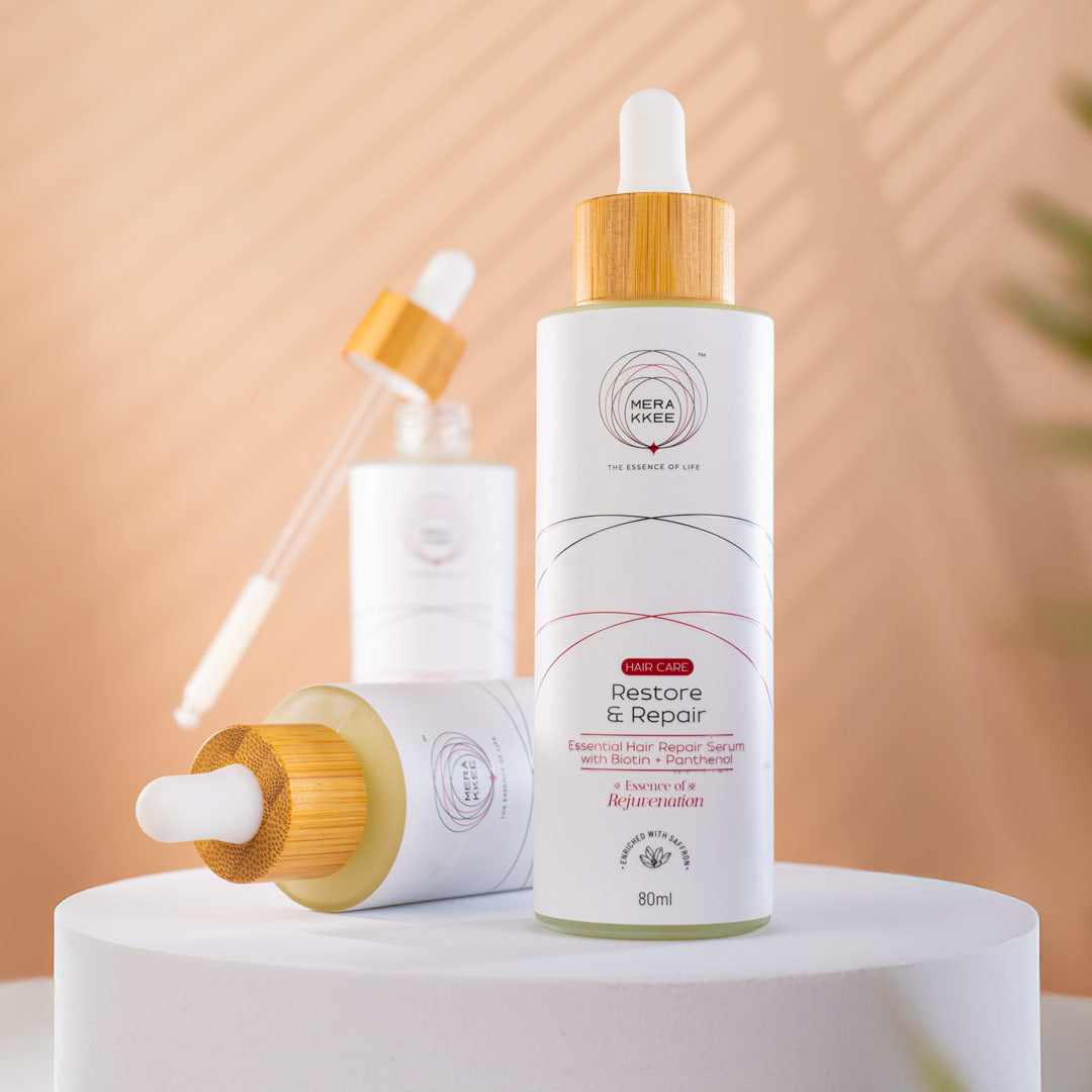 MERAKKEE Essential Hair Repair Serum — outer carton and serum bottle complete package — gift-ready premium hair care India