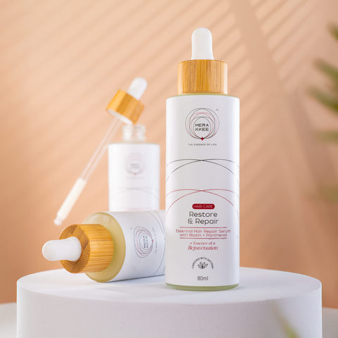 MERAKKEE Essential Hair Repair Serum — outer carton and serum bottle complete package — gift-ready premium hair care India