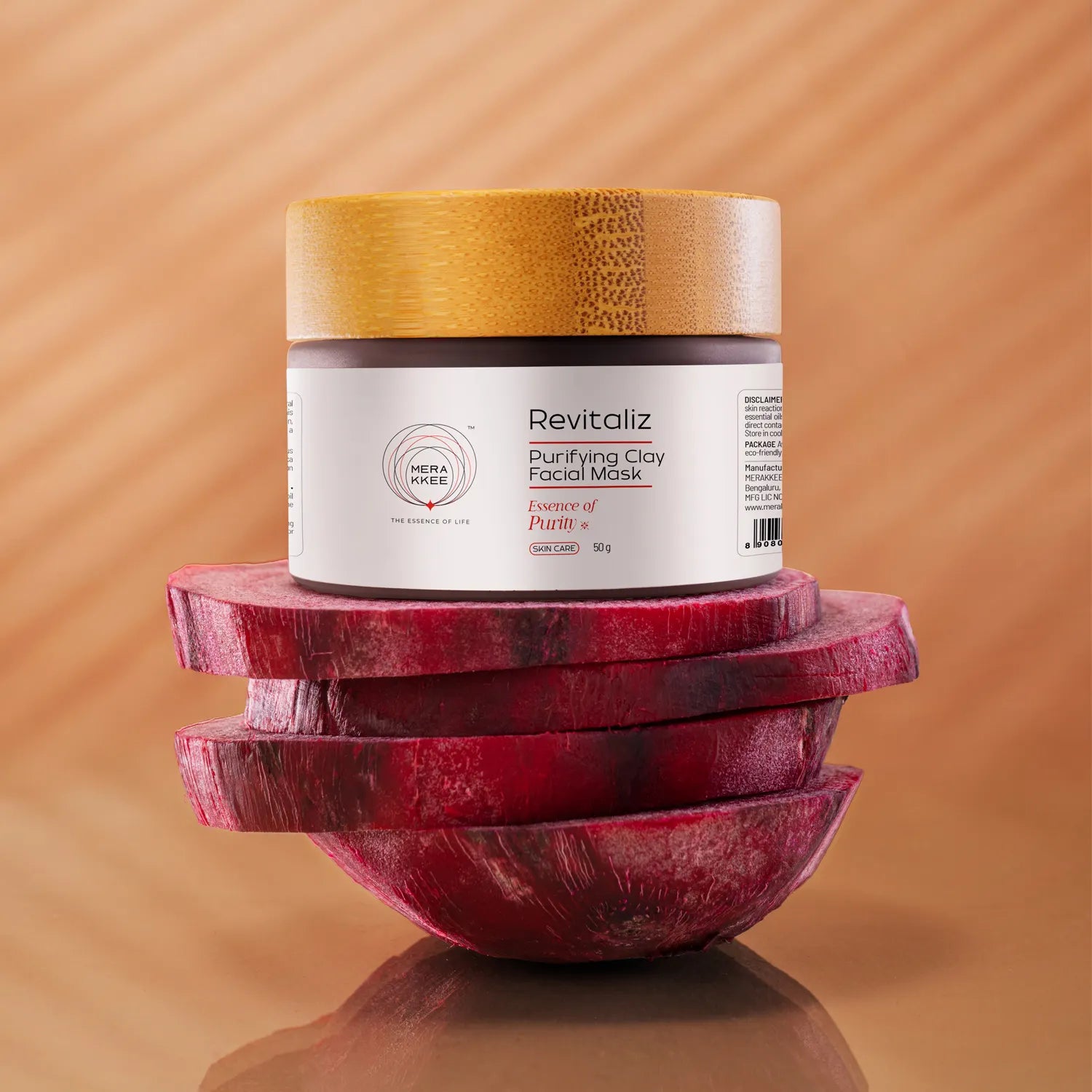 MERAKKEE Purifying Beetroot Facial Mask — model applying deep red mask on cheeks — Beetroot Saffron glow India