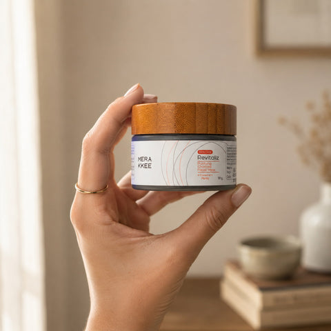 MERAKKEE Purifying Charcoal Facial Mask 50g — glass jar held in hand size reference — Revitaliz Purity India