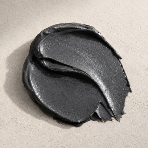 MERAKKEE Purifying Charcoal Facial Mask — deep black mask texture swatch on white — Charcoal Neem Tea Tree formula
