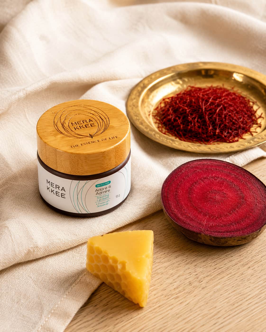 MERAKKEE Soothing Lip Balm — Saffron and Beetroot Oil hero ingredients close-up — Essence of Sensitivity India